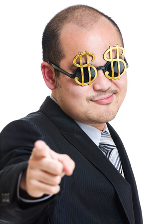 Rich businessman finger point to frontの写真素材