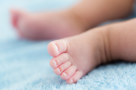 Tiny baby feetの写真素材
