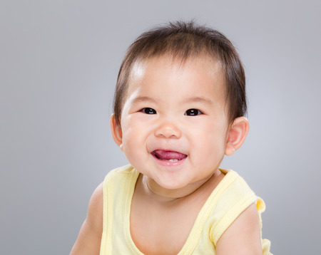 Smiling baby girlの写真素材