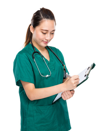 Medical person write on clipboardの写真素材