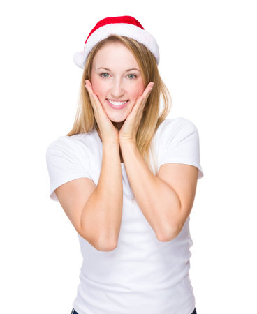 Cute woman with christmas hatの写真素材