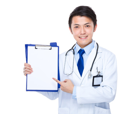 Doctor finger point to the white paper on folderの写真素材