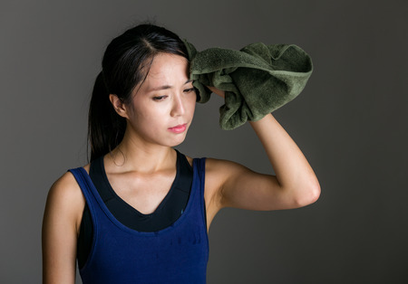 Sport girl wiped by towelの写真素材