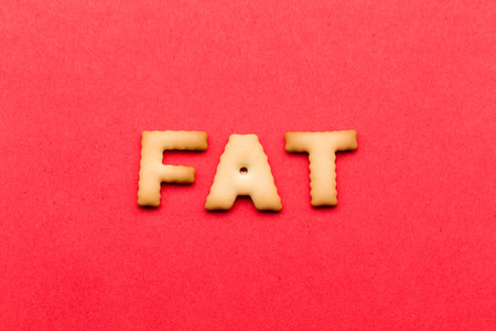 Fat cookies over the red backgroundの写真素材