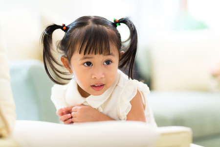 Girl play at homeの写真素材