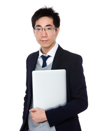 Business man hold with notebook computerの写真素材