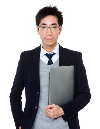 Asian businessman hold with laptop computerの写真素材