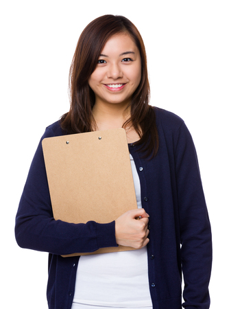 Young woman hold with clipboardの写真素材