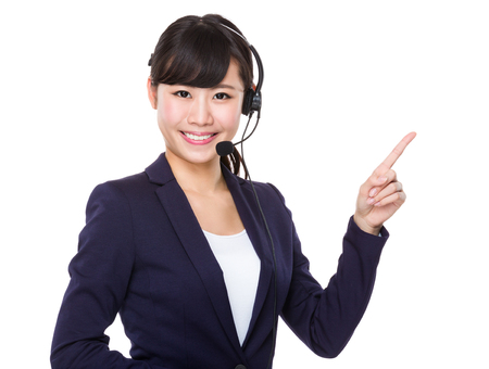 Customer services officer with finger point upの写真素材