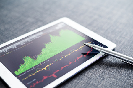 Stock market graph on tablet pc