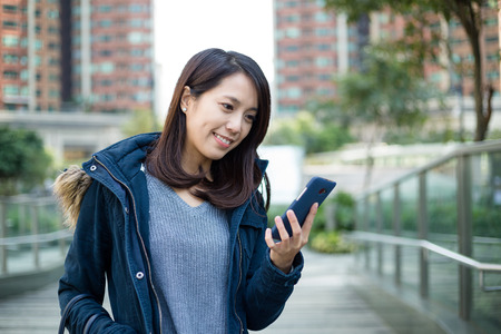 Young woman use the phoneの写真素材