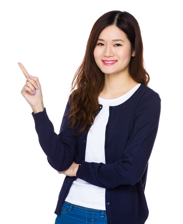 Asian Woman with finger point upの写真素材