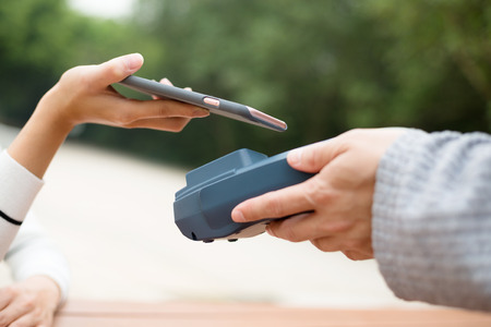 Customer pay with cellphoneの写真素材