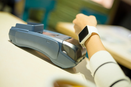 Customer using smart watch to payの写真素材