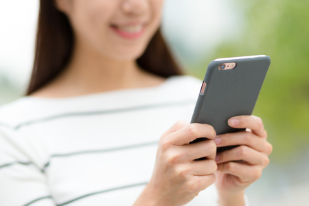 Woman use of mobile phoneの写真素材