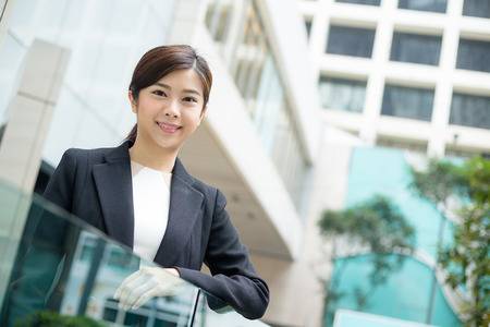 Business woman standing at outdoorの写真素材