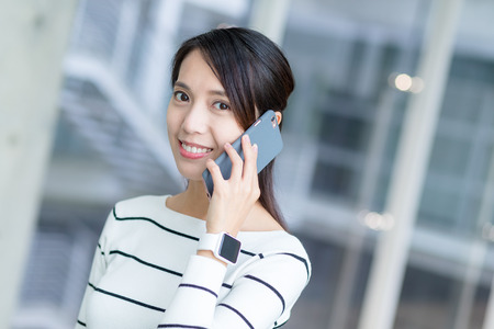 Woman chat on mobile phoneの写真素材