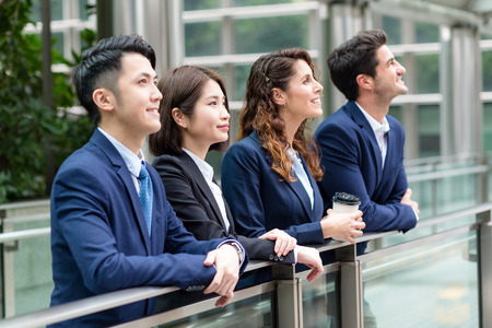 Group of business people looking far awayの写真素材