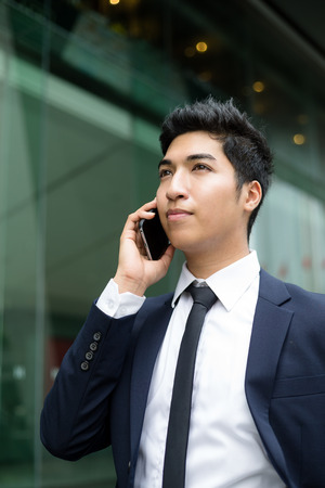 Businessman talk to mobile phoneの写真素材