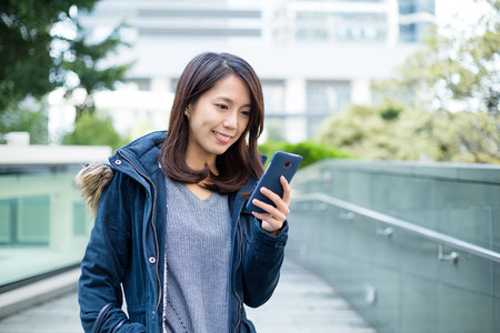 Woman use of mobile phoneの写真素材