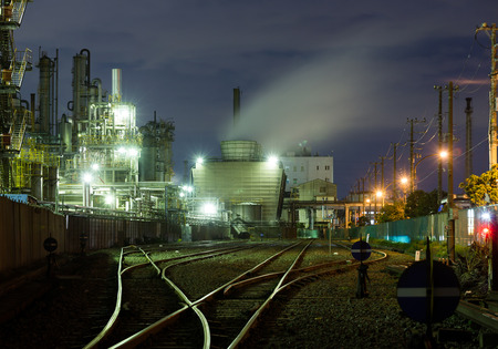 Oil-refinery plant at nightの写真素材