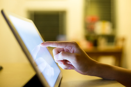 Hand touch on tablet