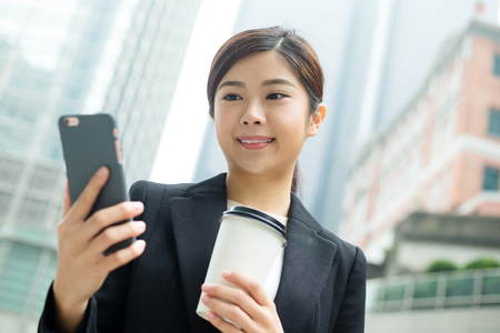 Young Business woman use of cellphoneの写真素材