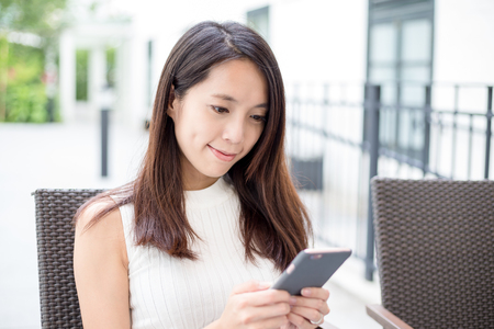 Womn use of mobile phoneの写真素材