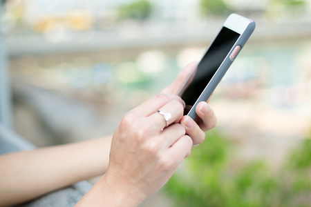 Woman using smart phoneの写真素材
