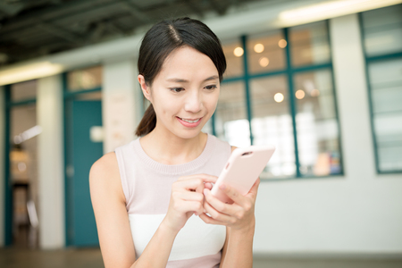 Woman use of mobile phoneの写真素材
