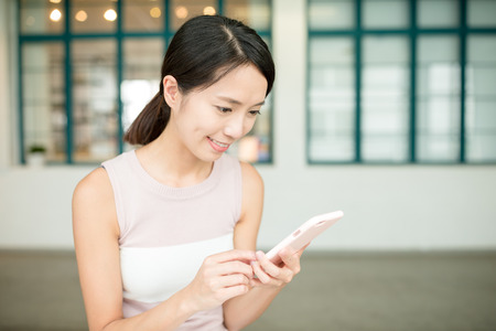 Woman use of cellphoneの写真素材