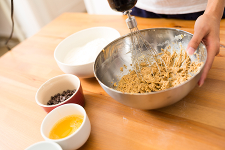 Woman mixing the dough
