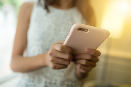 Woman using smart phoneの写真素材