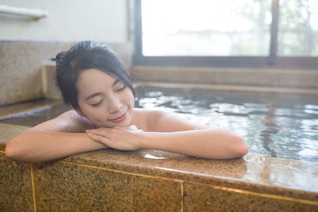 Woman enjoy onsenの写真素材