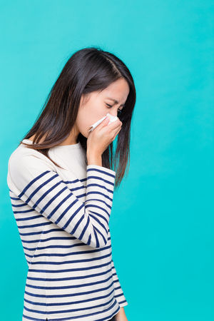 Asian Woman feeling unwellの写真素材