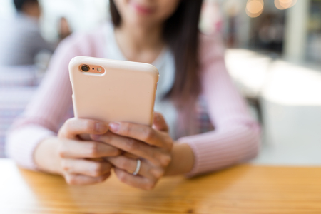 Woman use of mobile phoneの写真素材