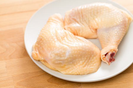 Raw chicken legsの写真素材