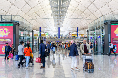 Hong Kong international airport, Hong Kong, September 2016 -: Crowded of people Hong Kong airport waiting hallのeditorial素材