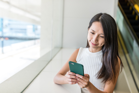 Woman use of mobile phoneの写真素材
