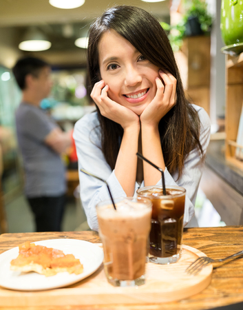 Woman in cafeの写真素材