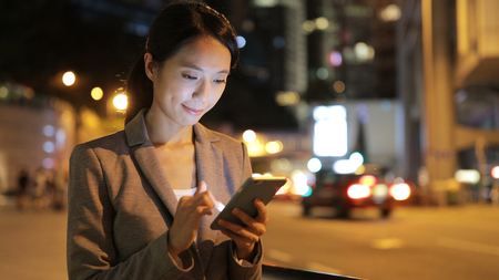 Business woman use of cellphoneの写真素材