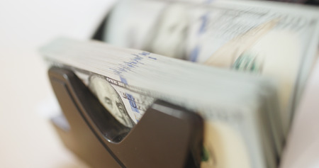 US dollar banknote in counting machine の写真素材