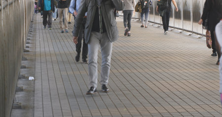 Hung Hom, Hong Kong 16 January 2018:- People walking in the pedestrian bridge 