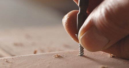 Drills the wooden plank の写真素材