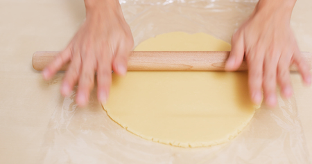 Rolling dough for making cookies at home 