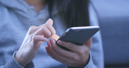 Woman use of mobile phone の写真素材