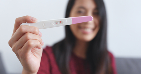 Woman got pregnant の写真素材