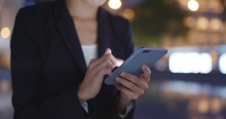 Business woman use of mobile phone の写真素材