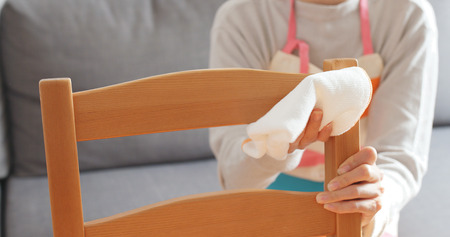 Housewife tidy up at home の写真素材