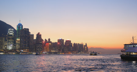 Victoria harbour, Hong Kong 16 January 2018:- Hong Kong at sunset のeditorial素材